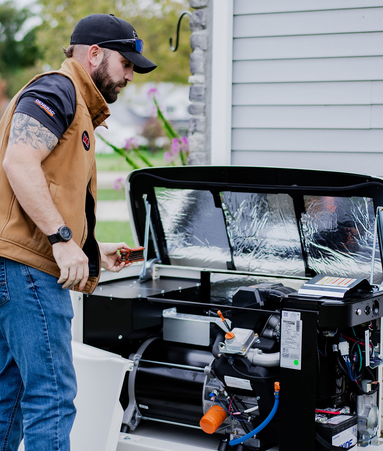 Weekley Electric technician performing Generac generator service maintenance Columbus Ohio Weekley Electric technician performing Generac generator service maintenance Columbus Ohio